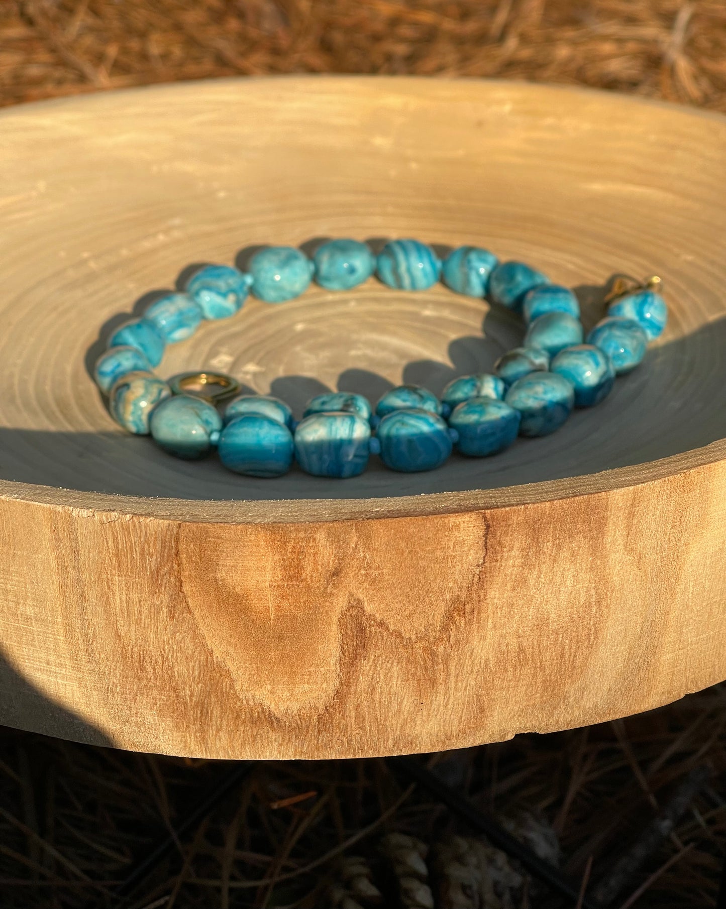 Cerulean Lace Necklace: Faceted Crazy Lace Agate with a deep gold luxe toggle clasp