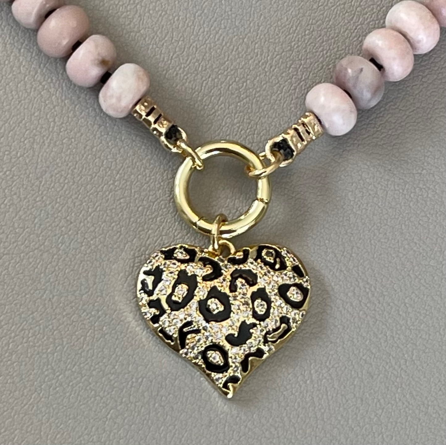 The Pink Leopard Necklace: Natural matte pink opals hand knotted on black silk w Dalmatian Jasper accents Gold pavé leopard heart OOAK
