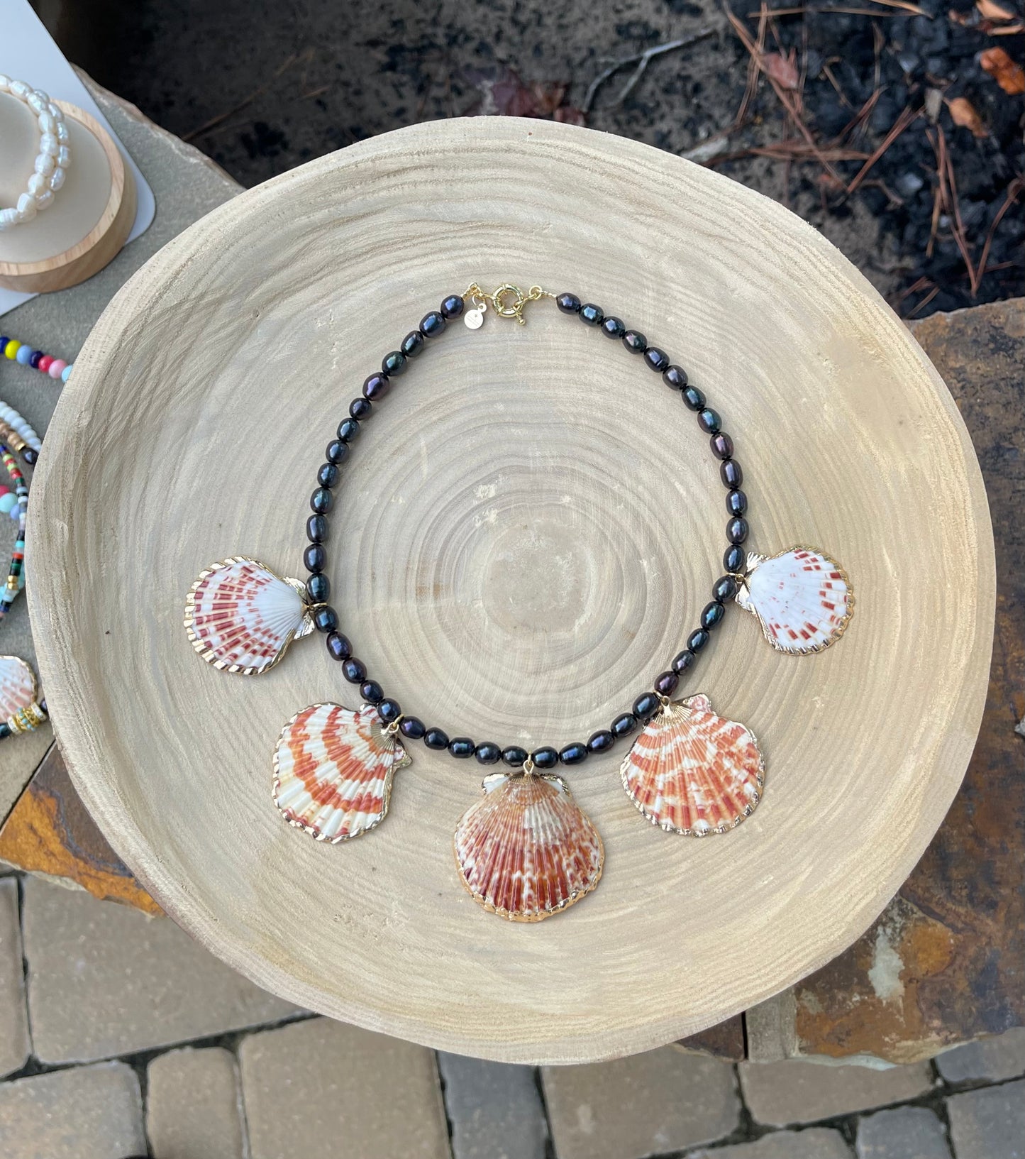 Midnight on the Beach Necklace: Midnight blue freshwater pearls with natural Lions Paw seashell pendants