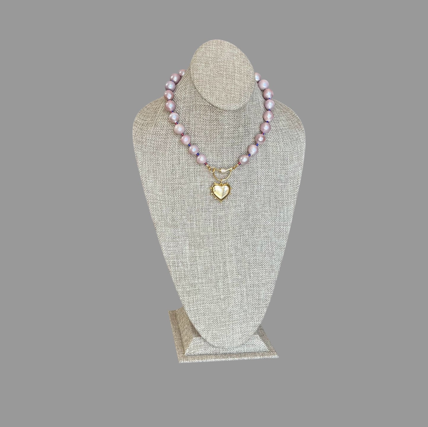 The Yves Necklace: Lavender Edison Pearls w/glass spacers, a gold crescent clasp holding a heart pendant OOAK