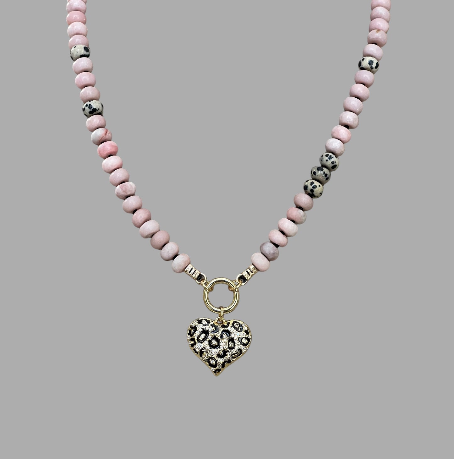 The Pink Leopard Necklace: Natural matte pink opals hand knotted on black silk w Dalmatian Jasper accents Gold pavé leopard heart OOAK
