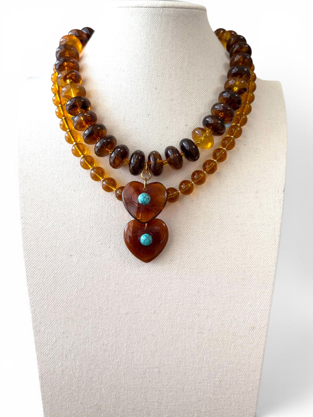 The Wanderheart Necklace: Tortoiseshell beads with a Turquoise centered heart pendant