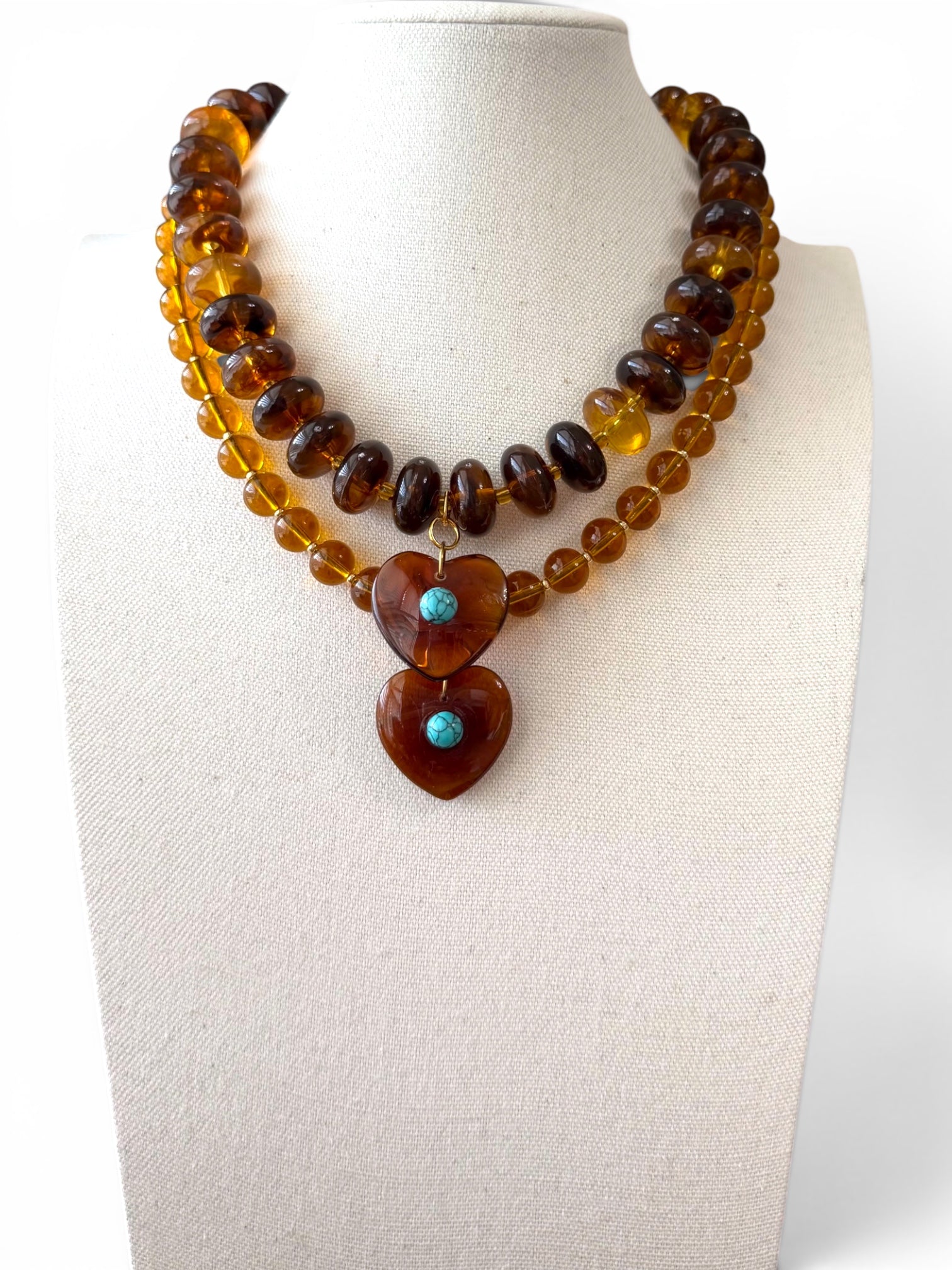 The Wanderheart Necklace: Tortoiseshell beads with a Turquoise centered heart pendant