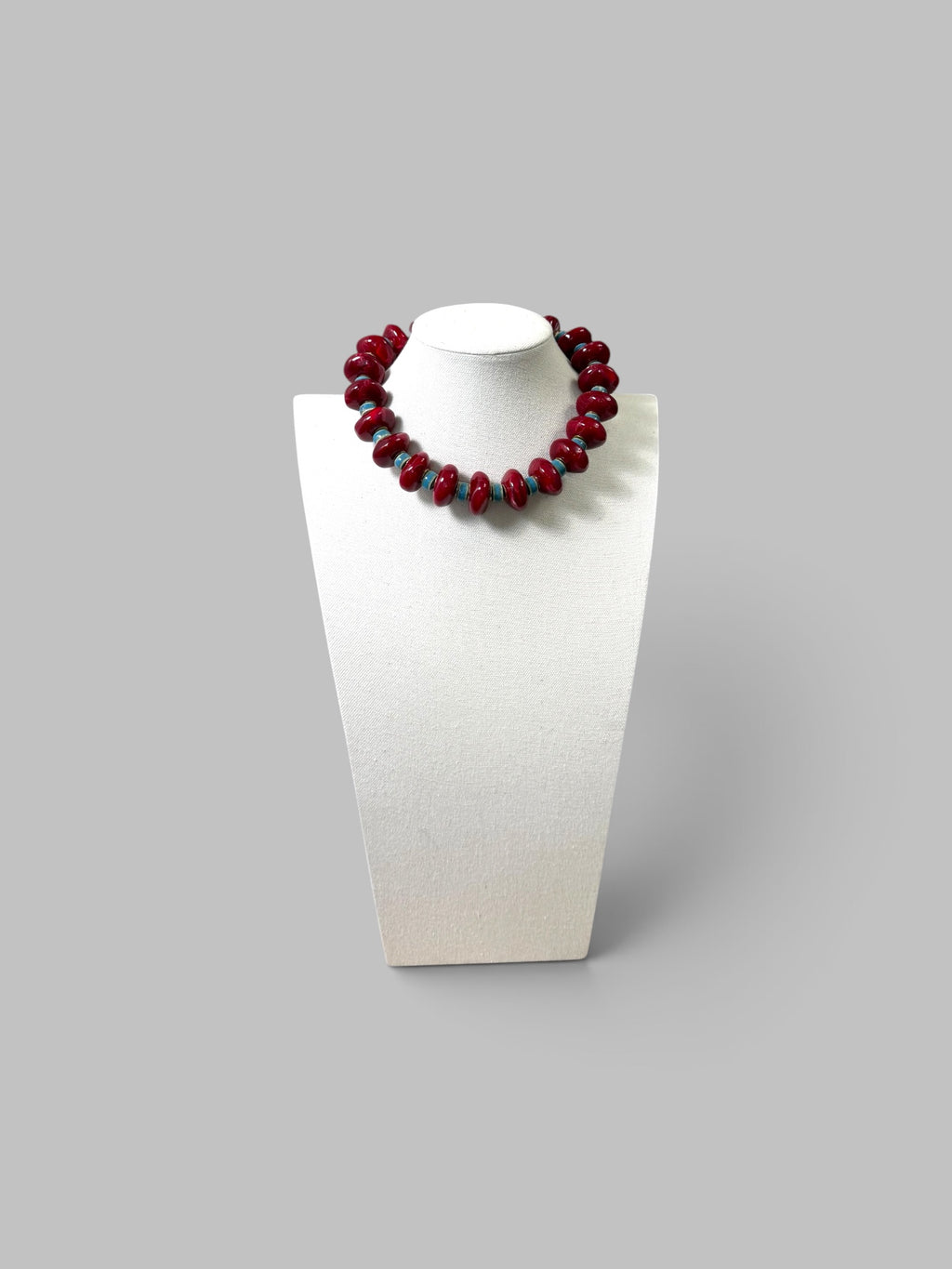 Crimson & Coast: Resin and Ceramic beads with gold brass accents and clasp