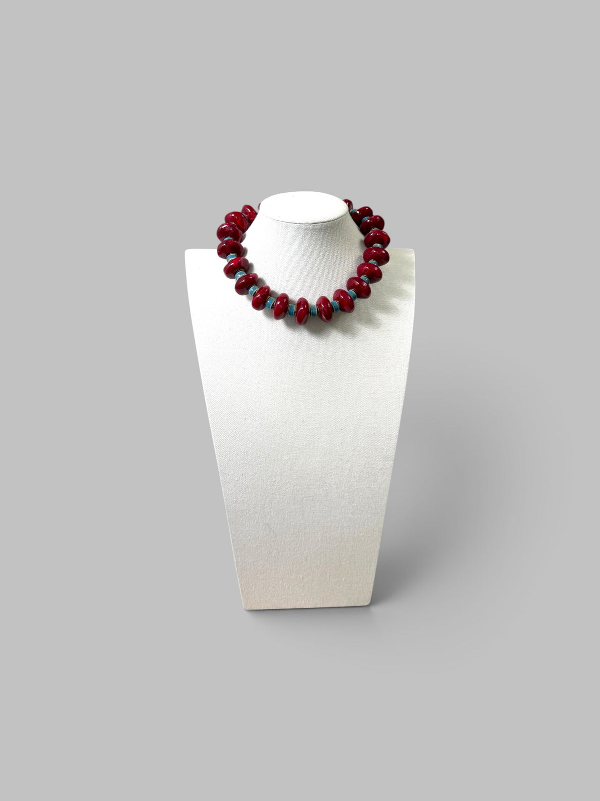 Crimson & Coast: Resin and Ceramic beads with gold brass accents and clasp