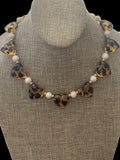 Leopard Love Necklace: Acrylic Leopard Print hearts with gold glass accent beads and Freshwater Pearls Gold Pavé toggle clasp