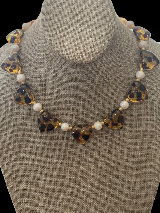 Leopard Love Necklace: Acrylic Leopard Print hearts with gold glass accent beads and Freshwater Pearls Gold Pavé toggle clasp