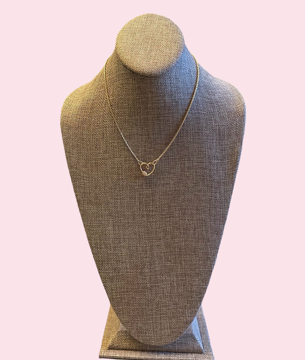 Be Still My Heart Necklace: A thin gold cable chain w/ an adorable heart that doubles as a clasp and a charm holder Pavé screw closure OOAK