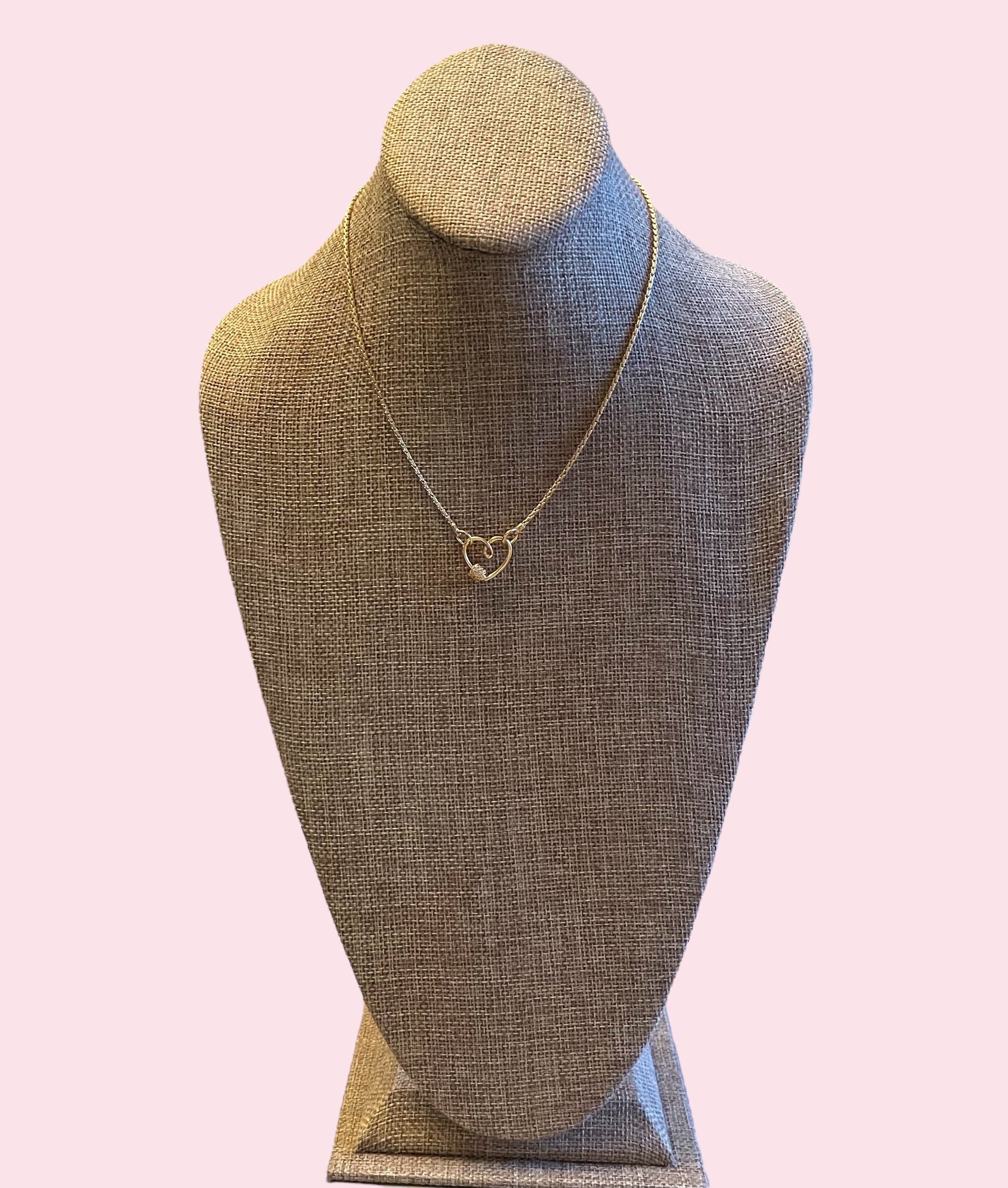 Be Still My Heart Necklace: A thin gold cable chain w/ an adorable heart that doubles as a clasp and a charm holder Pavé screw closure OOAK