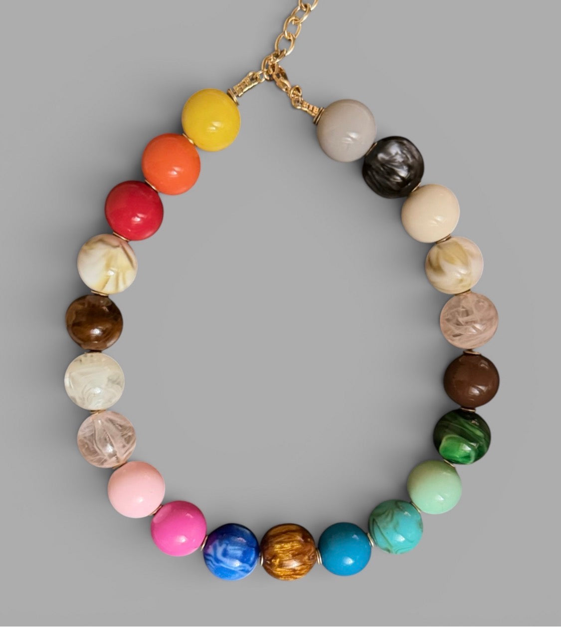 The Gathered Color Necklace: multi color intricate beads with a tiny pop of gold