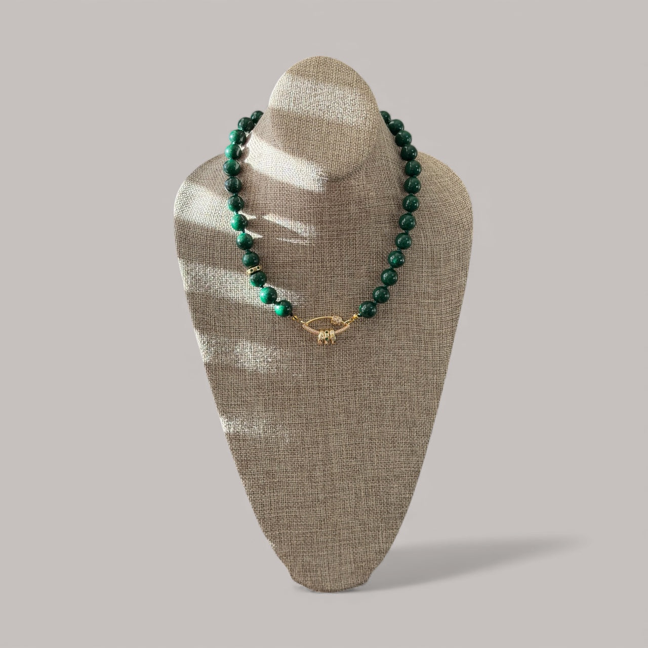 Vintage Vogue Necklace: Vintage Chinese Jade beads hand-knotted on matching satin cord•Gold pavé accents and charms
