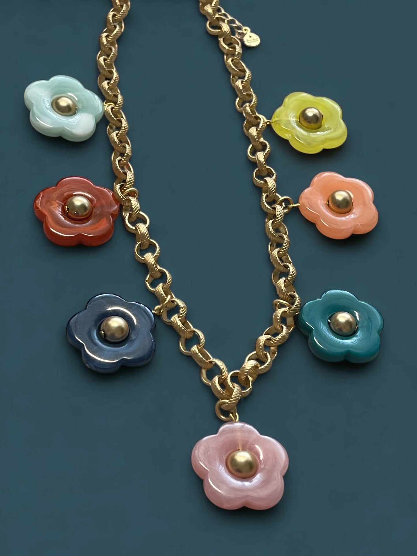 Bloom Necklace: Acrylic flowers with brushed gold centers on a brushed gold Rolo chain
