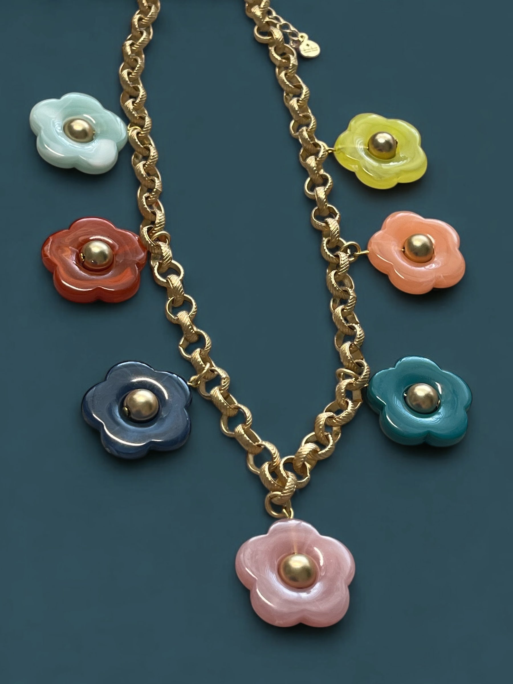 Bloom Necklace: Acrylic flowers with brushed gold centers on a brushed gold Rolo chain