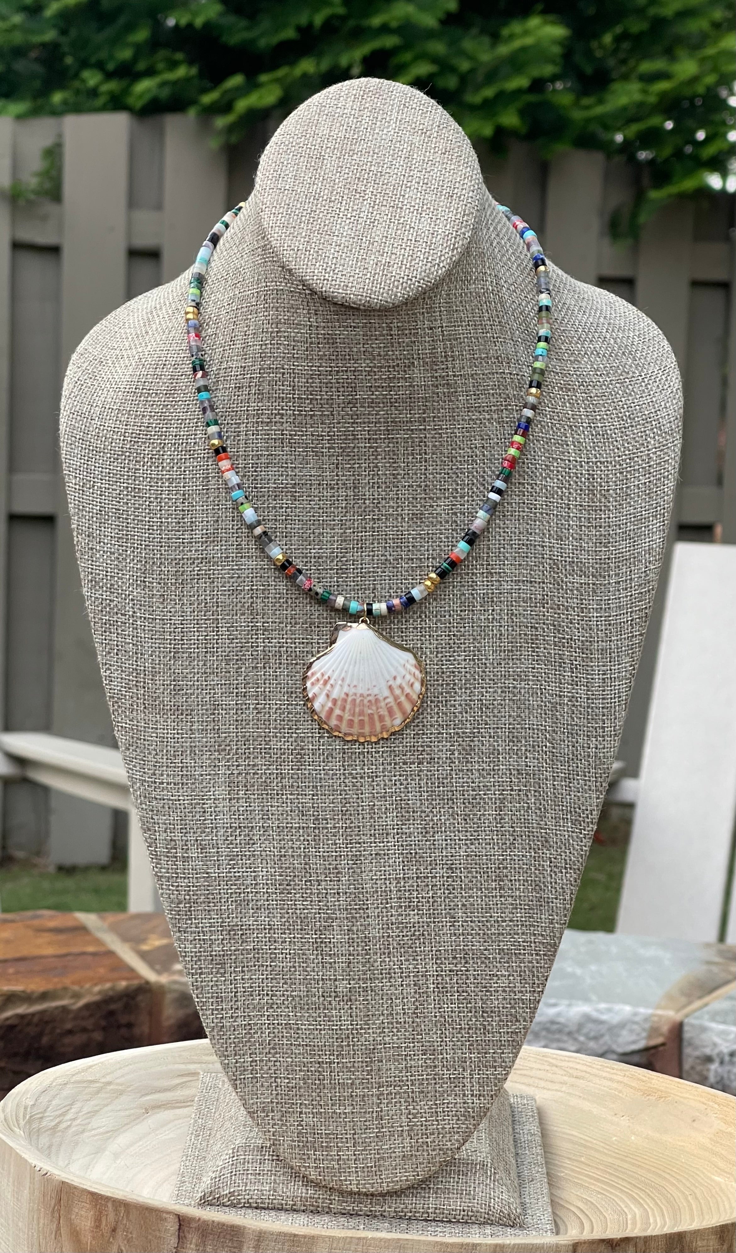 Multi Gem Seashell Necklace: Large variety of natural gemstone beads gold accents Natural seashell pendant