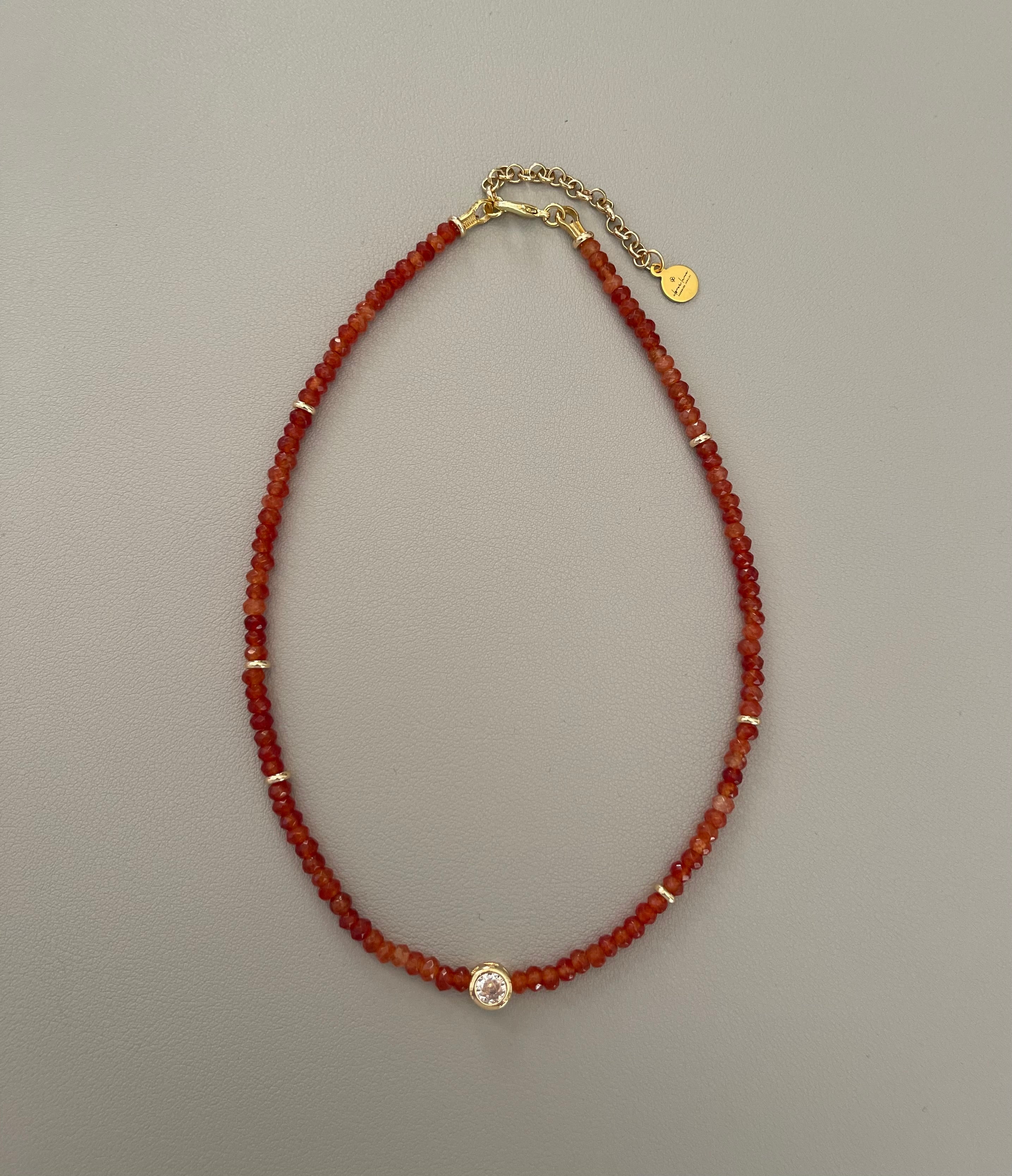 A Little Luxe Necklaces: Various natural stones in many colors, faceted, with a Bezel set Cubic Zirconia centerpiece