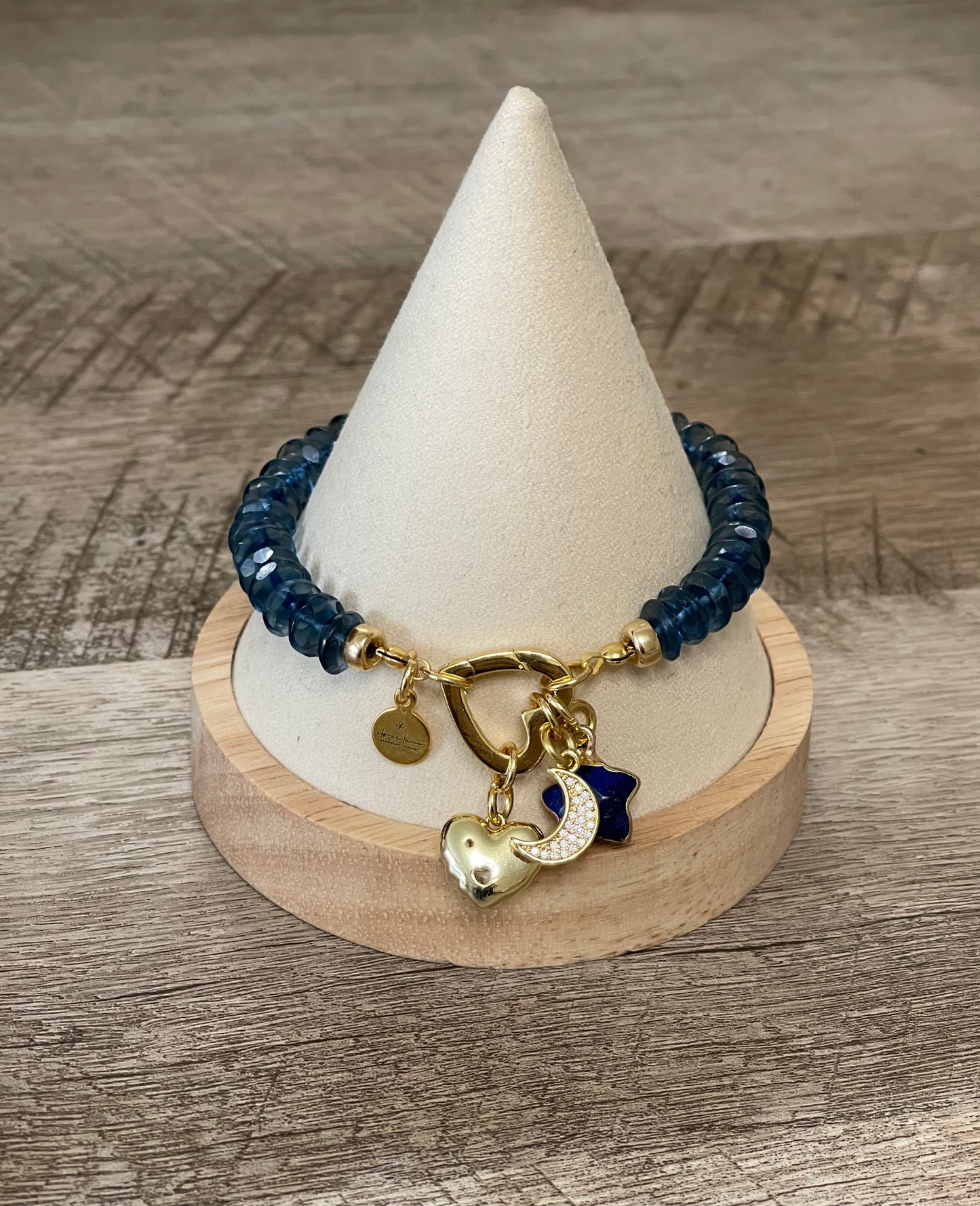 London Blue Bracelet: Hand knotted London Blue Topaz faceted gemstone beads Gold heart clasp with Lapis Lazuli star, Pavé moon and CZ accent heart charms OOAK