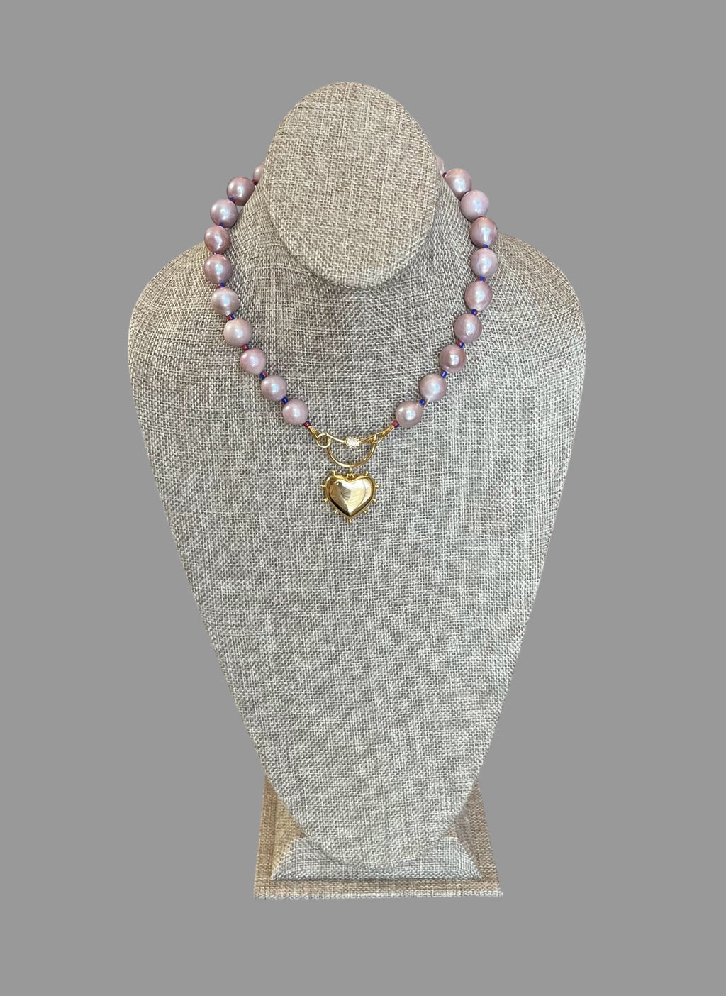 The Yves Necklace: Lavender Edison Pearls w/glass spacers, a gold crescent clasp holding a heart pendant OOAK