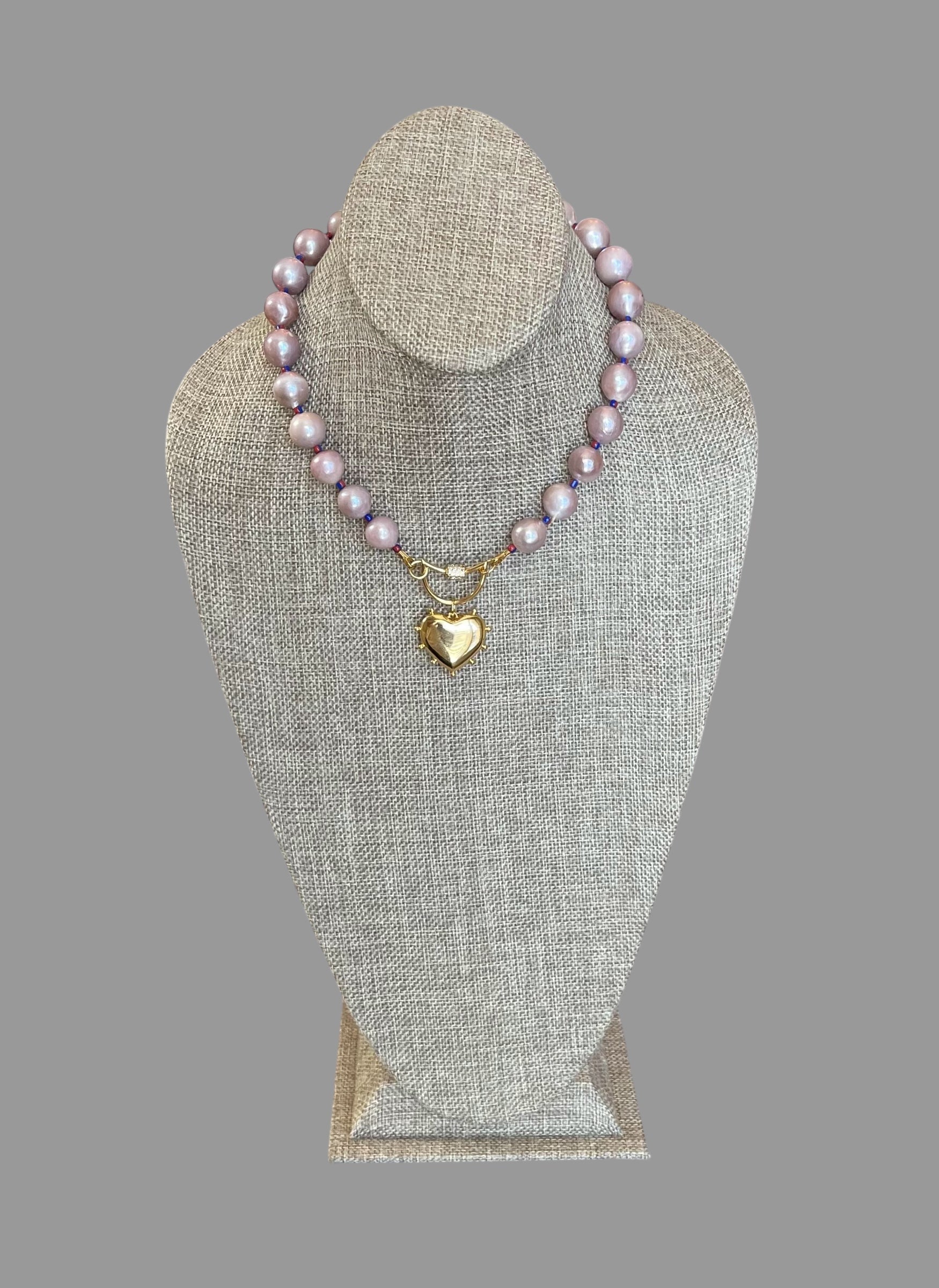 The Yves Necklace: Lavender Edison Pearls w/glass spacers, a gold crescent clasp holding a heart pendant OOAK