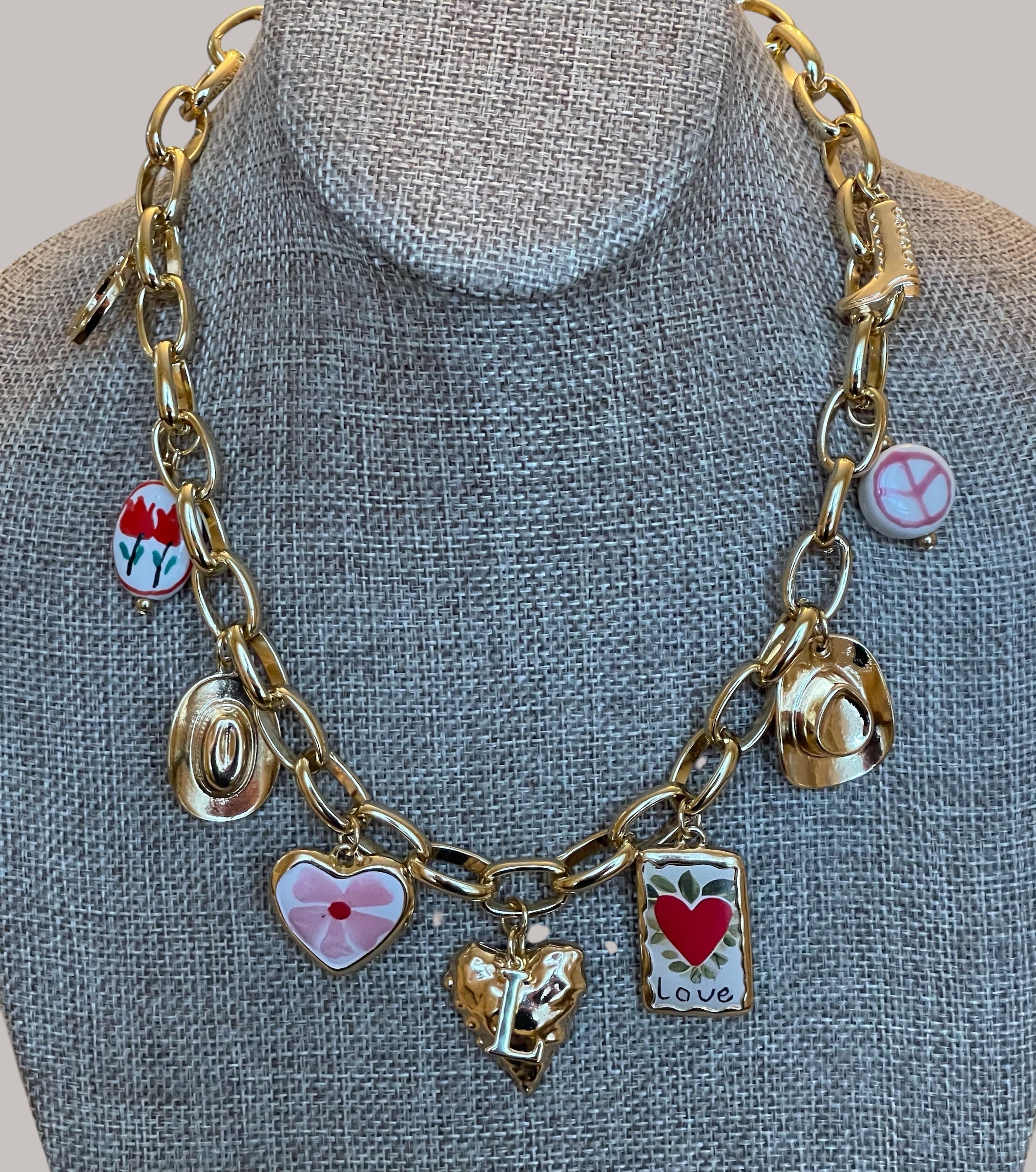 The Rachel Necklace: OOAK Thick gold chain w various fun gold plated charms in a pink and red theme