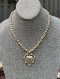 Bold Bijoux in Gold Necklace: Matte gold throughout Tiny pearls Statement heart