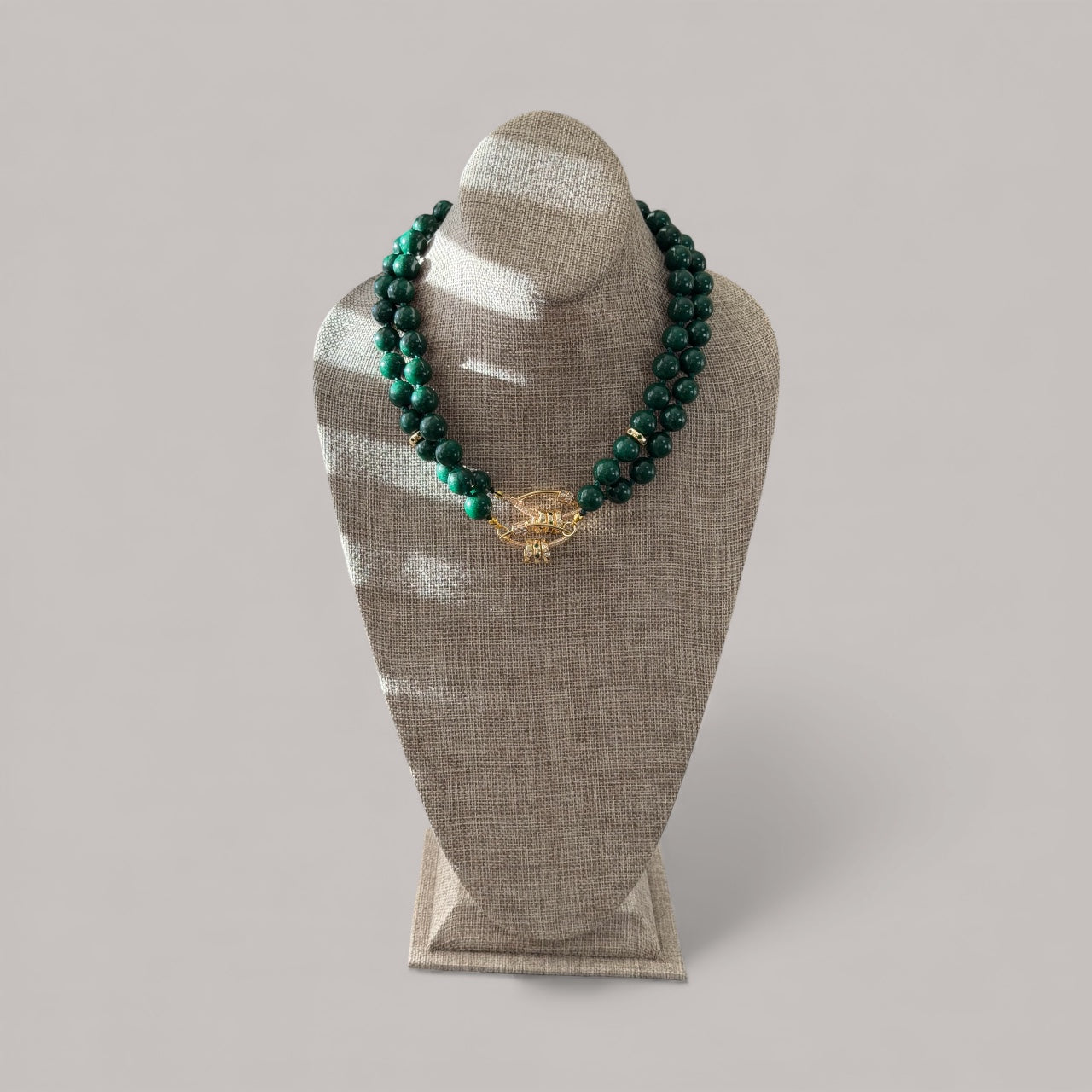 Vintage Vogue Necklace: Vintage Chinese Jade beads hand-knotted on matching satin cord•Gold pavé accents and charms
