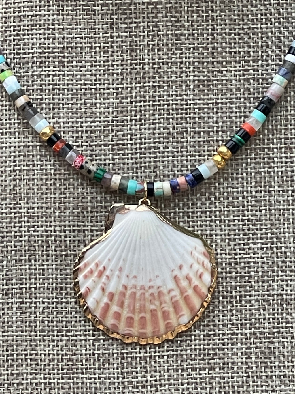 Multi Gem Seashell Necklace: Large variety of natural gemstone beads gold accents Natural seashell pendant