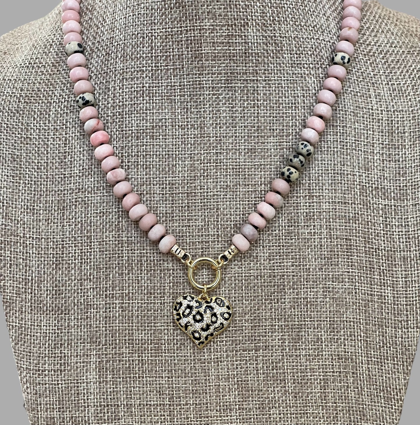 The Pink Leopard Necklace: Natural matte pink opals hand knotted on black silk w Dalmatian Jasper accents Gold pavé leopard heart OOAK