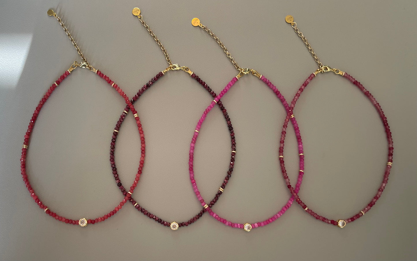 A Little Luxe Necklaces: Various natural stones in many colors, faceted, with a Bezel set Cubic Zirconia centerpiece