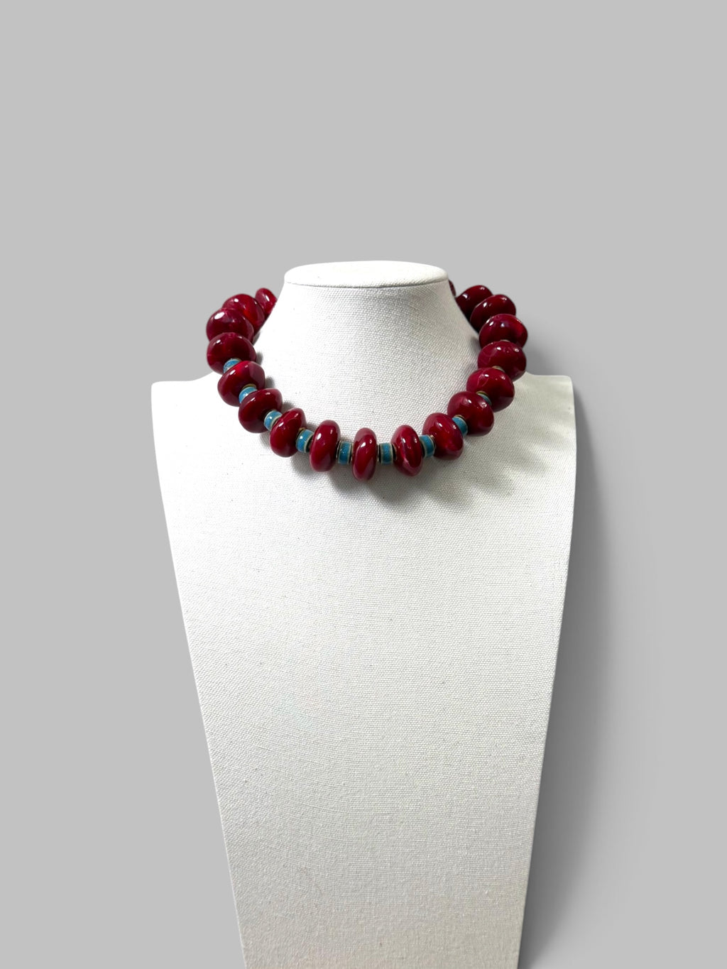 Crimson & Coast: Resin and Ceramic beads with gold brass accents and clasp