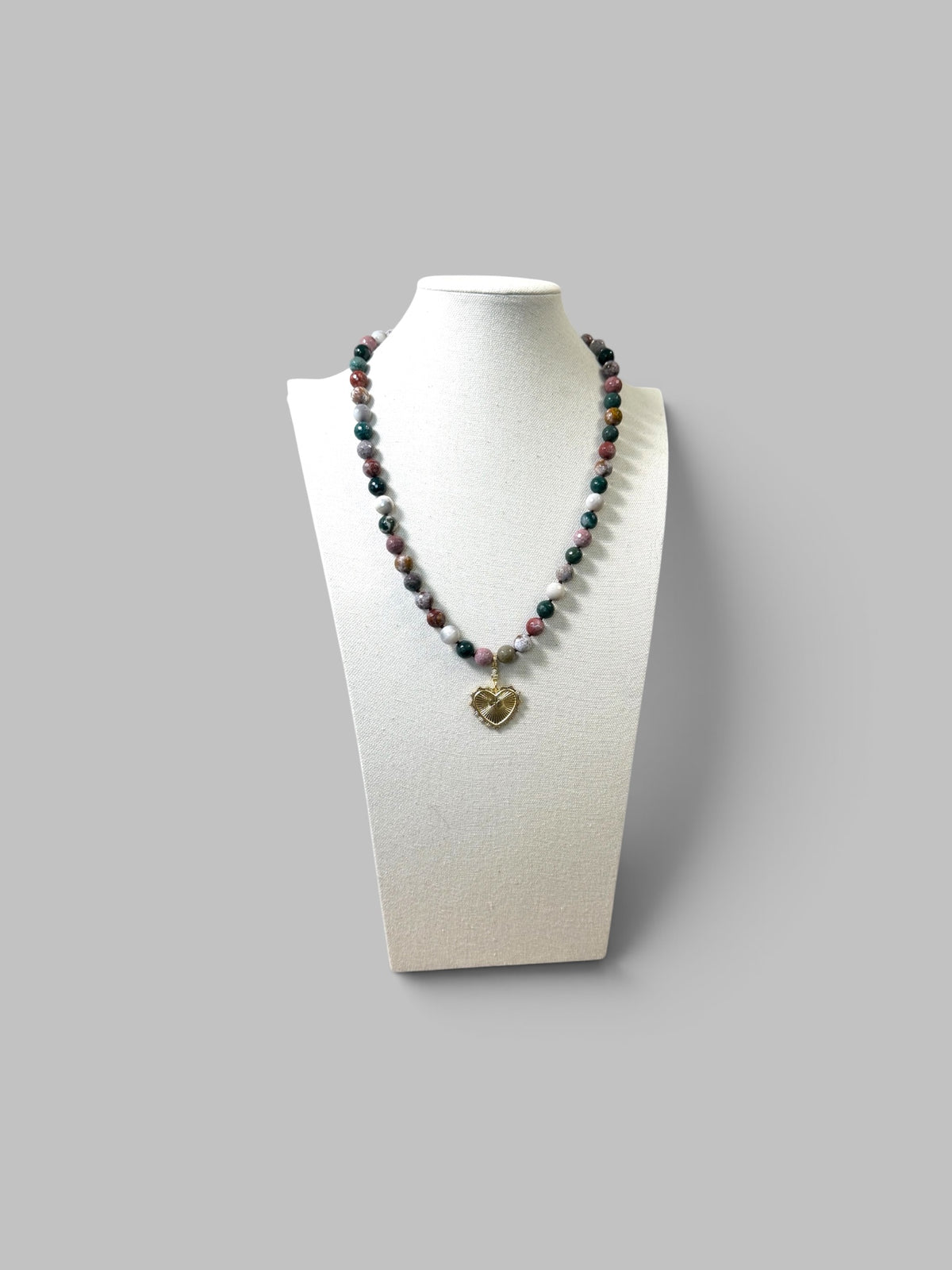 Heart & Soul Necklace: Faceted Ocean Jasper handknotted on deep burgundy. Removable gold heart
