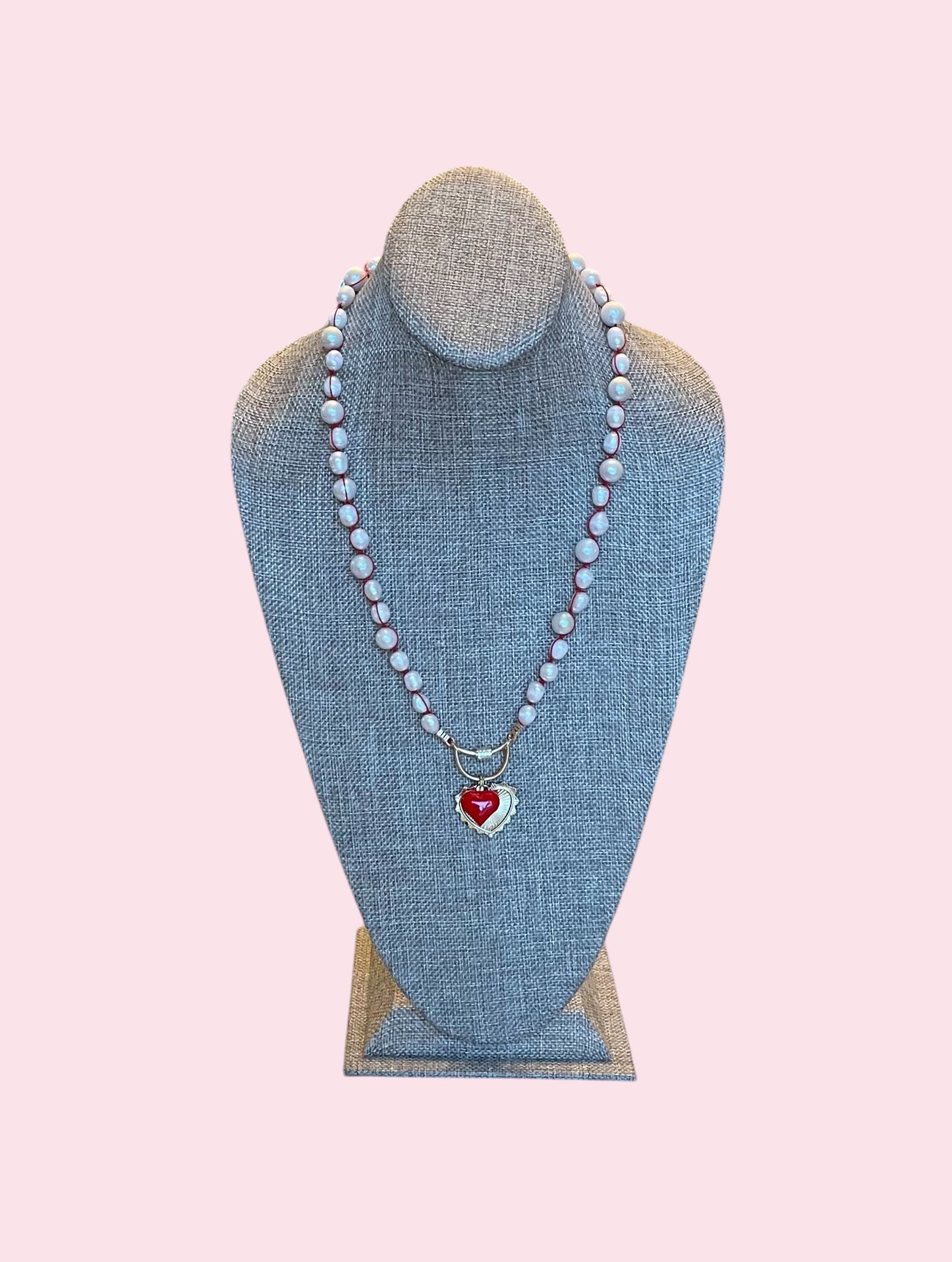 The Heartstrings Necklace: Luminous high quality freshwater pearls hand knotted on red silk w/ gold and red enameled heart charms, pavé accented clasp/charm holder OOAK
