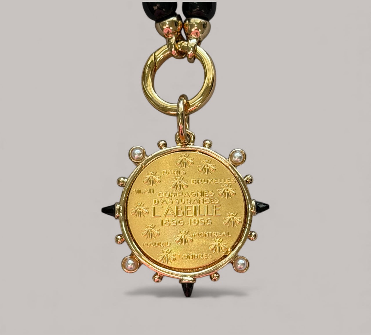 Très Chic Necklace: Hand knotted Black Onyx beads with a French Replica Vintage Pendant OOAK