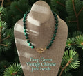 Vintage Vogue Necklace: Vintage Chinese Jade beads hand-knotted on matching satin cord•Gold pavé accents and charms
