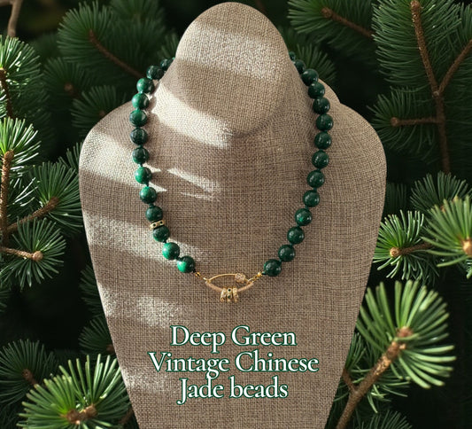 Vintage Vogue Necklace: Vintage Chinese Jade beads hand-knotted on matching satin cord•Gold pavé accents and charms