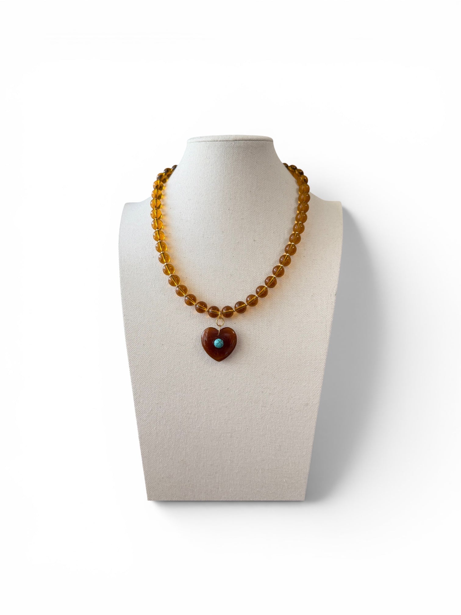 The Honeystone Heart Necklace: Glass beads & pendant with a turquoise center