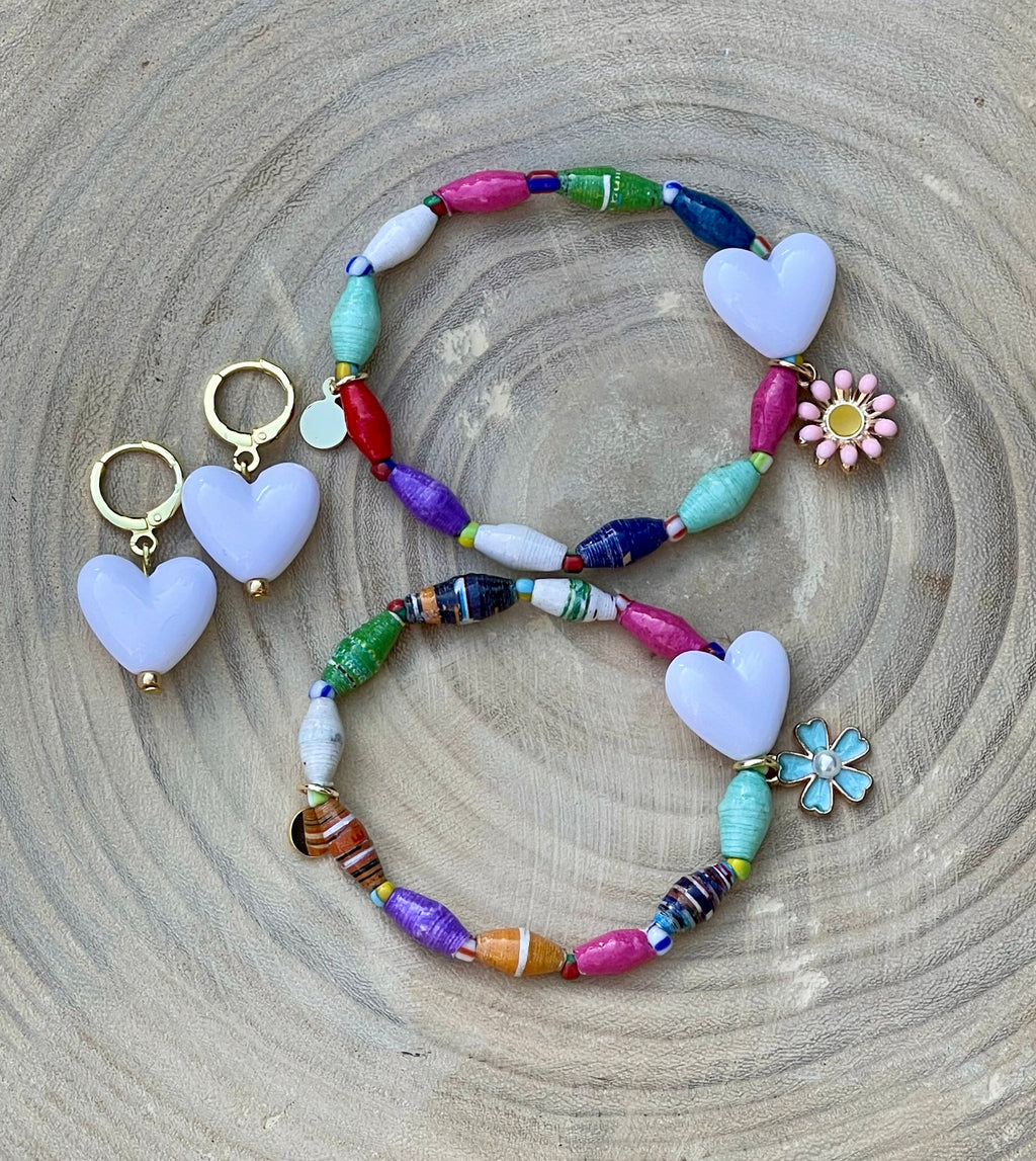 Kindred Colors Bracelet: Recycled paper bicone shaped beads, glass spacer beads, shiny white heart and flower charm