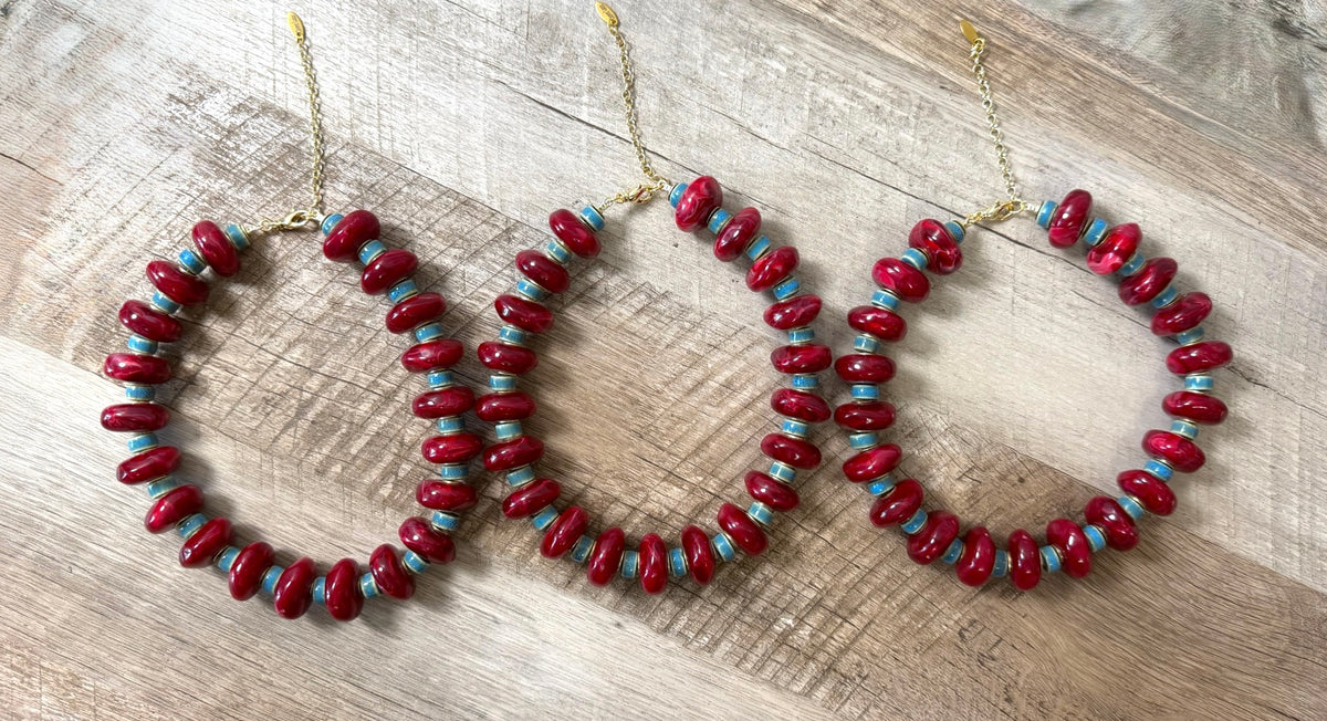 Crimson & Coast: Resin and Ceramic beads with gold brass accents and clasp