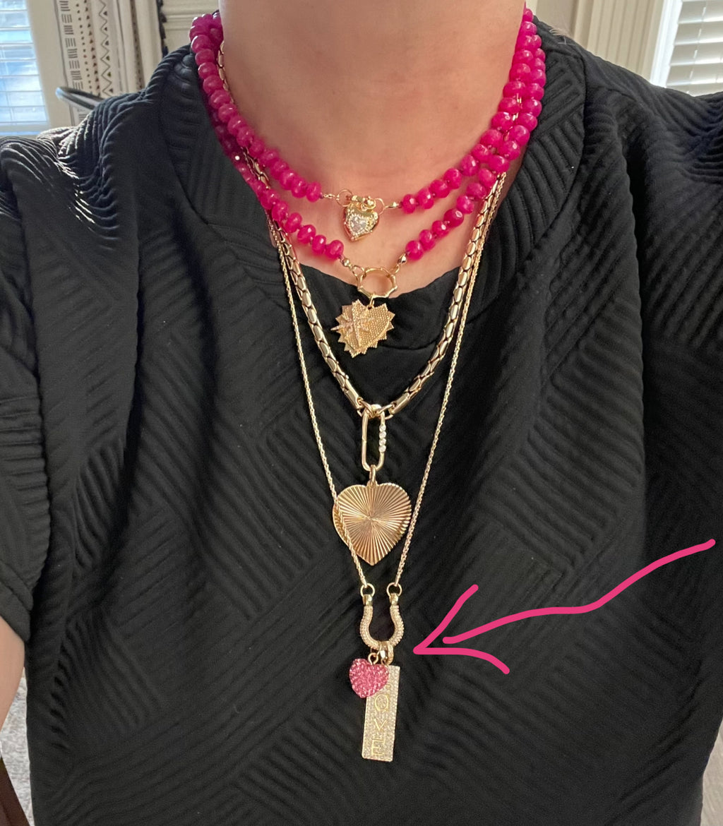 OOAK Stirrup of Love Charm Holder Necklace: Cobra chain with a pavé stirrup holding 2 charms- A pink sparkle 3D heart and a pavé LOVE sign