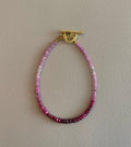 Gradient Ruby Bracelet: Genuine Ruby gemstones Textured gold heart toggle clasp OOAK