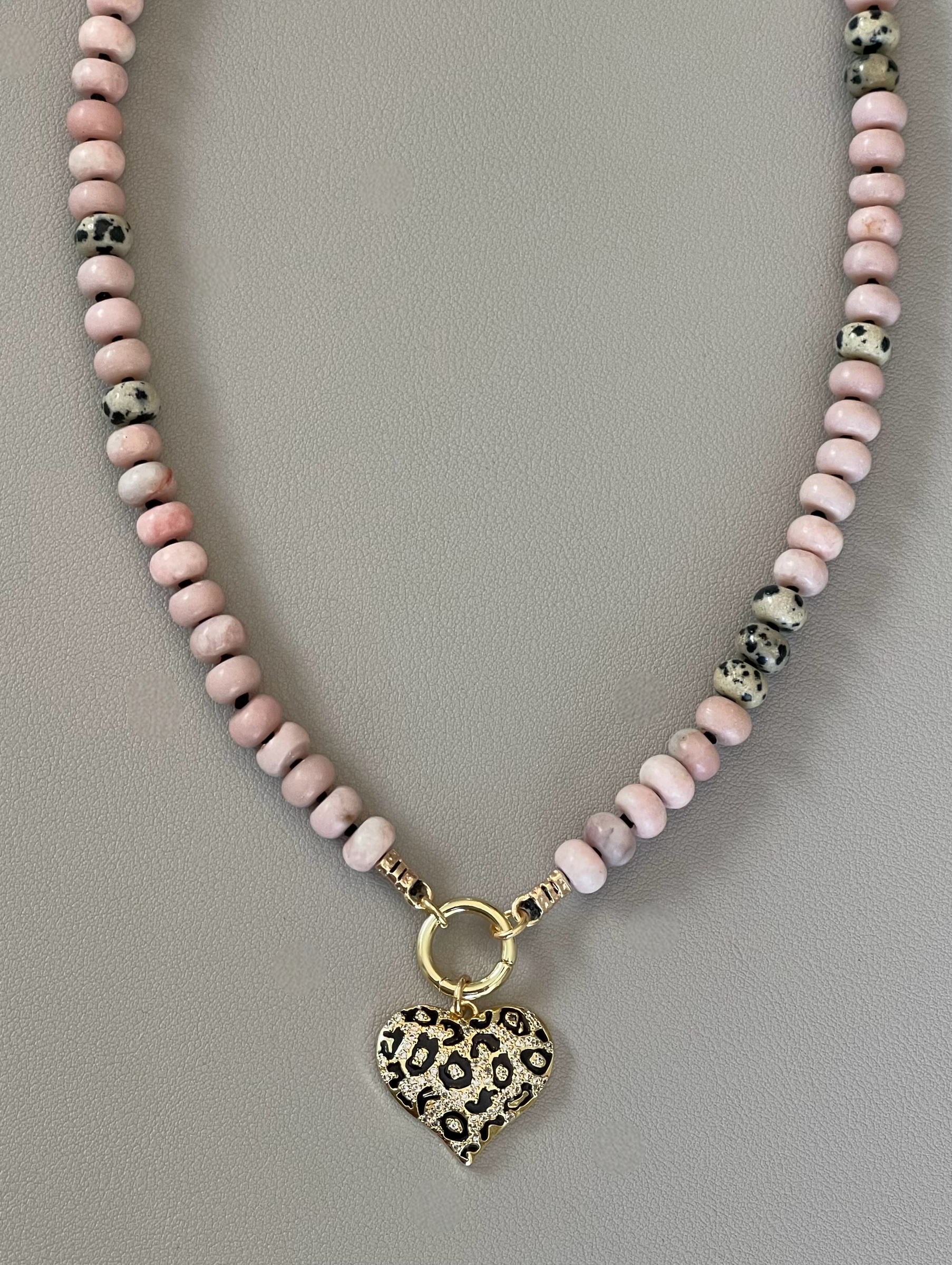 The Pink Leopard Necklace: Natural matte pink opals hand knotted on black silk w Dalmatian Jasper accents Gold pavé leopard heart OOAK