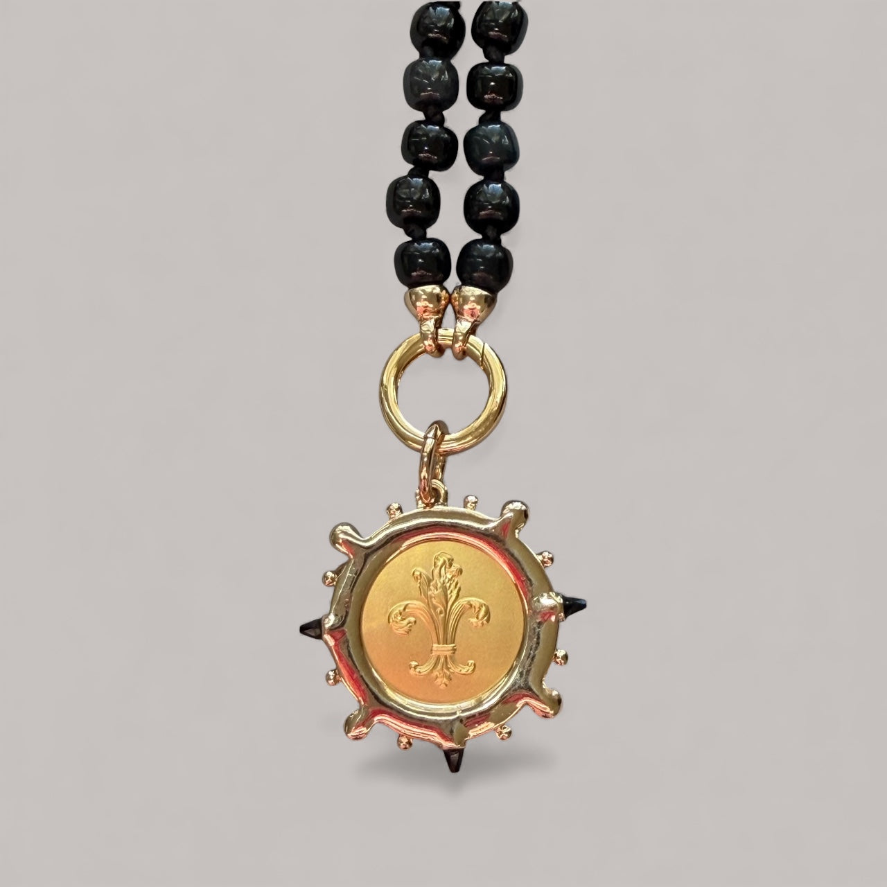 Très Chic Necklace: Hand knotted Black Onyx beads with a French Replica Vintage Pendant OOAK