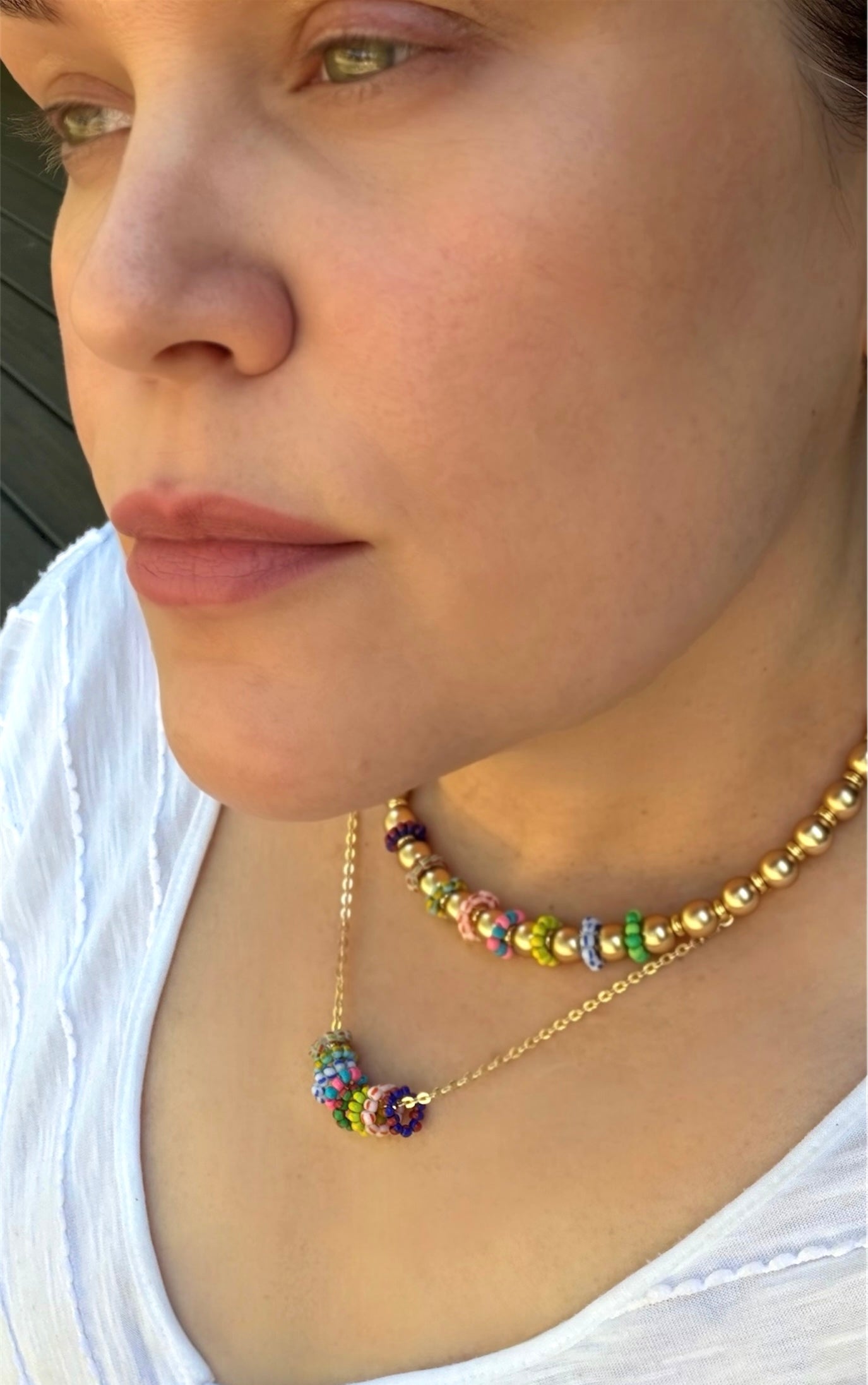 The Inner Circle Necklace: A Gold Filled diamond cut cable chain w/ mini glass bead circle charms