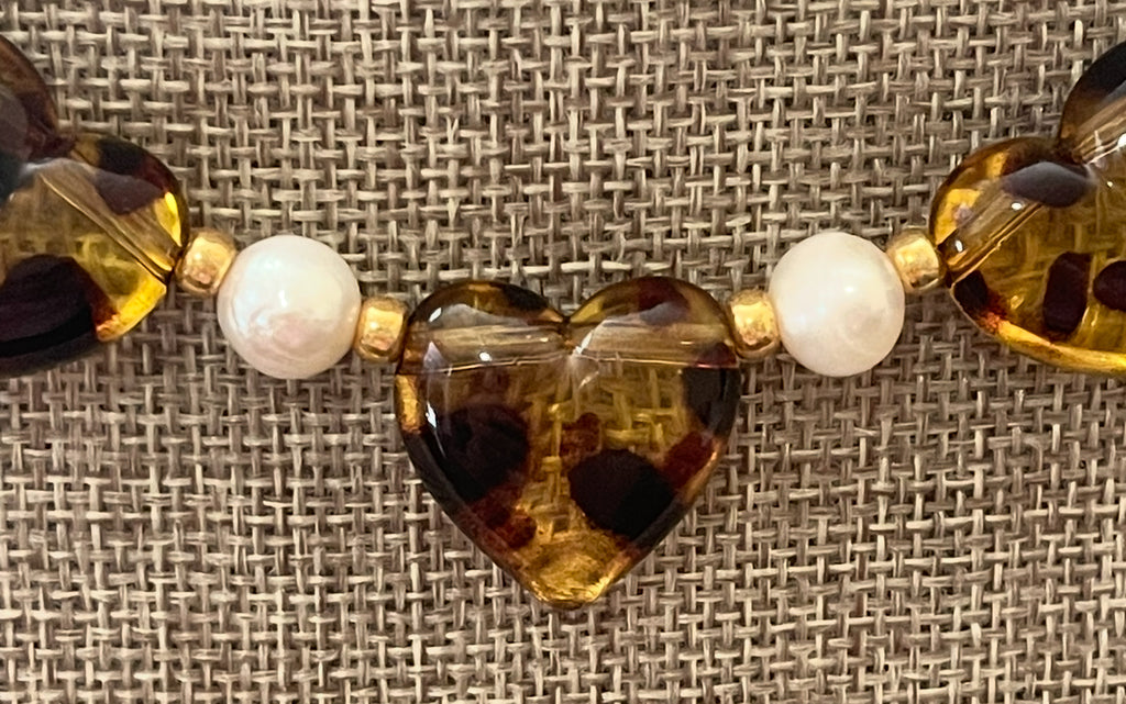 Leopard Love Necklace: Acrylic Leopard Print hearts with gold glass accent beads and Freshwater Pearls Gold Pavé toggle clasp