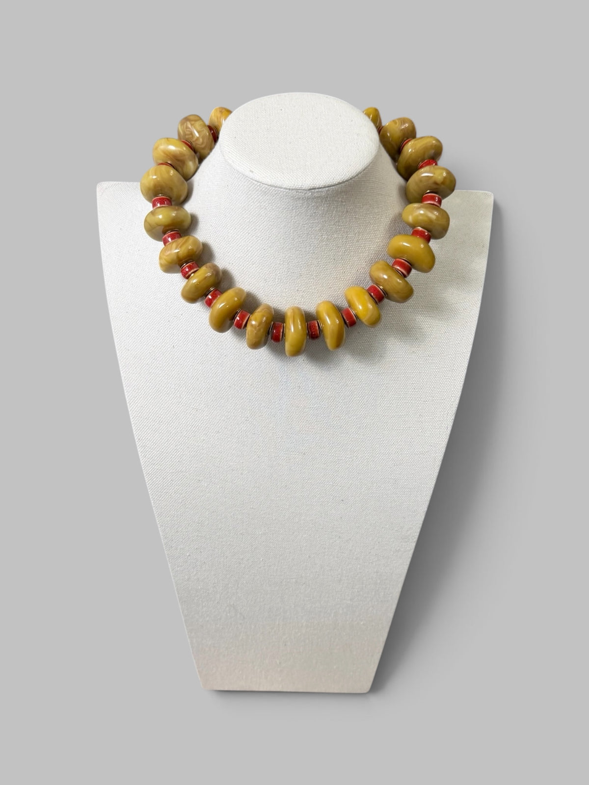 Ochre & Brick: Resin, ceramic & brass beads Gold clasp and extender
