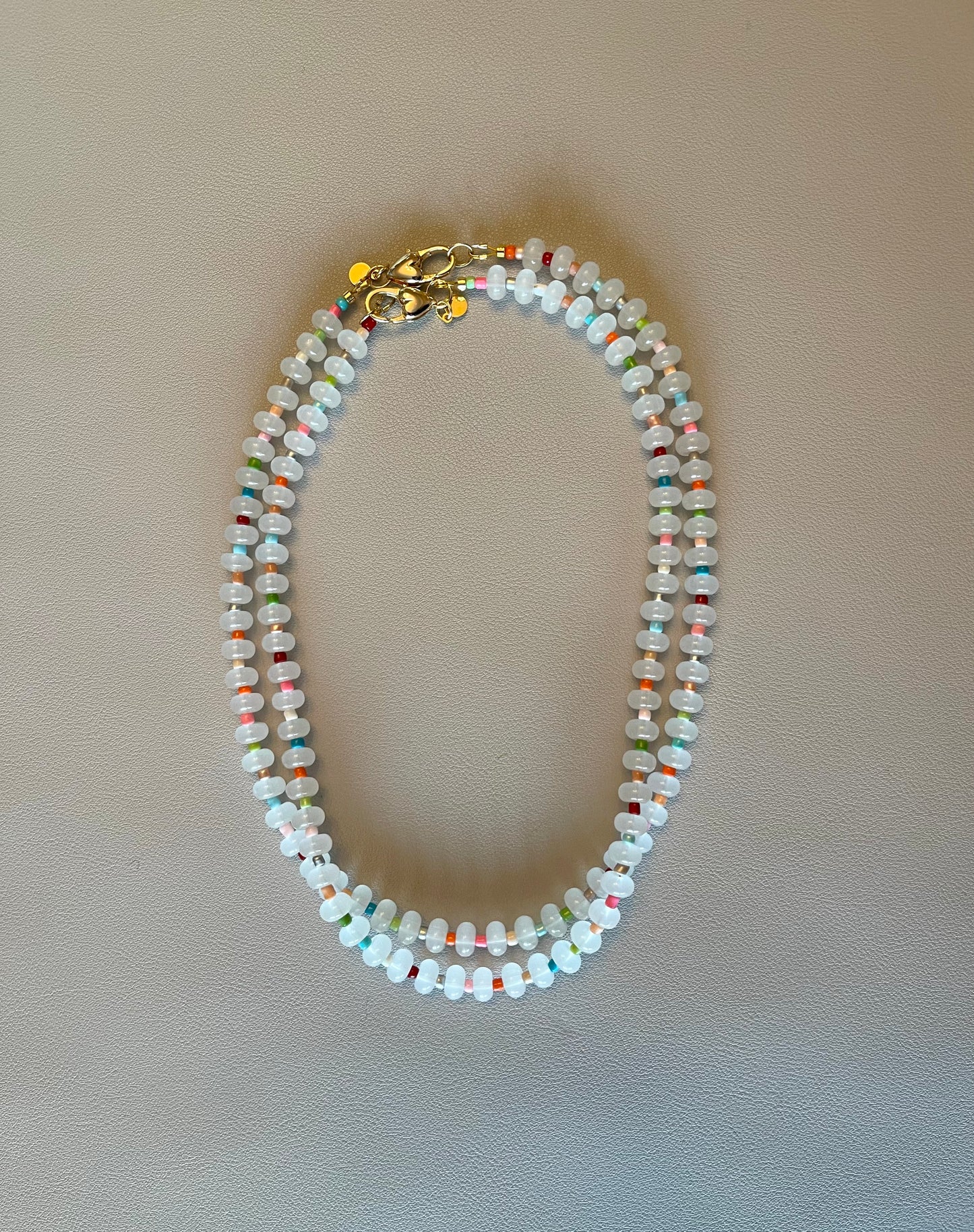 The Poppy Necklace: All glass colorful beads with a gold filled clasp and extender chain