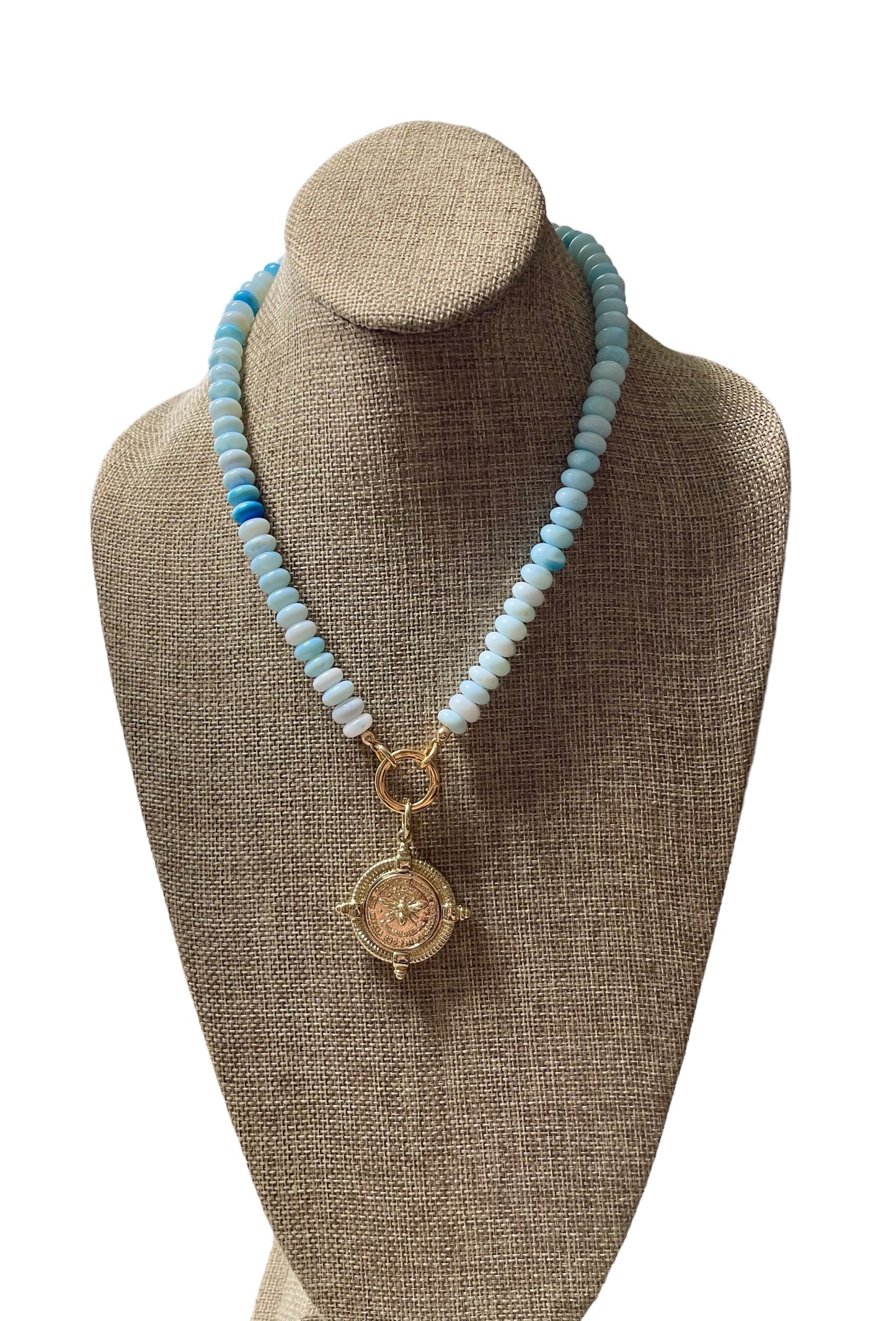 The Skylar Necklace: Sky Blue Opals with a Gold Circle Clasp and French Bee Coin Style Charm