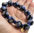 Midnight Bloom Bracelet: Hand patterned Millifiori Javanese Glass beads on Stretch elastic cord, Lapis Lazuli spacer beads OOAK