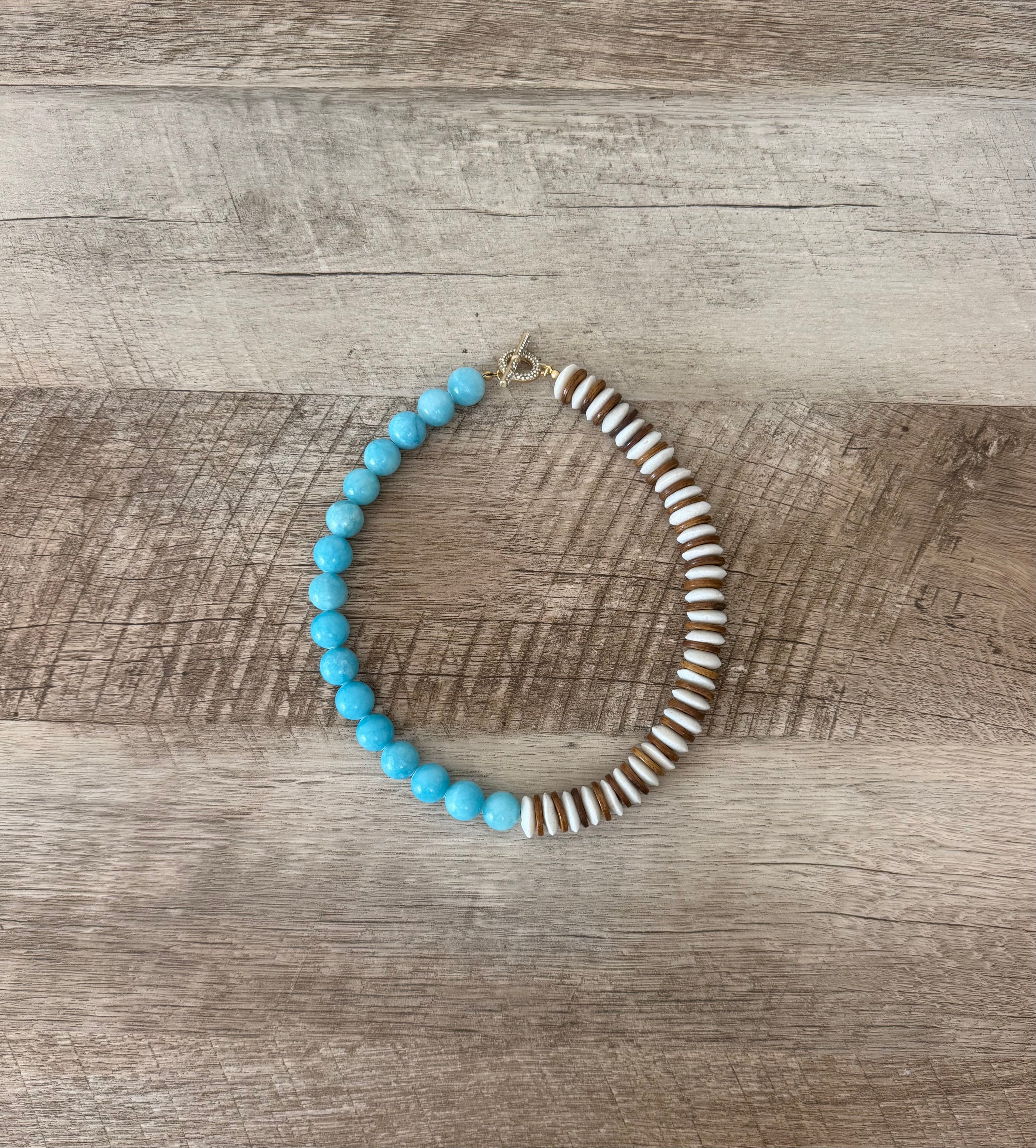 Sky & Timber Necklace: Ashanti glass, wood, and Jade with gold pavé clasp