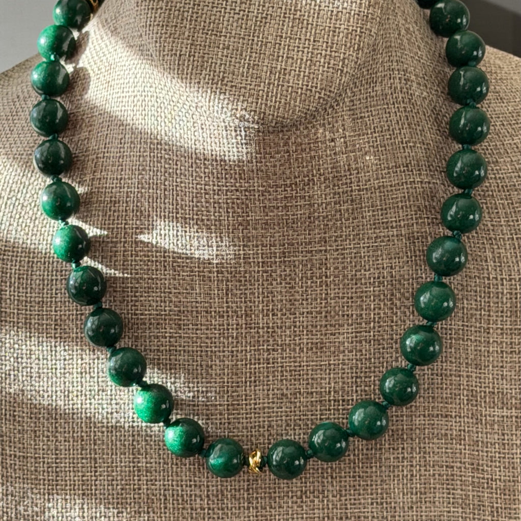 Vintage Vogue Necklace: Vintage Chinese Jade beads hand-knotted on matching satin cord•Gold pavé accents and charms