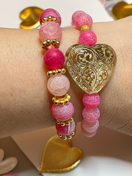 OOAK Ombré Hot Pink & Gold Stack (2) Hot pink ombré crackled glass beads with gold brass accent beads a puffy clear acrylic engraved heart bead